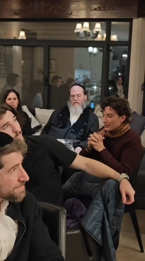 Akiva participants sharing a conversation indoors