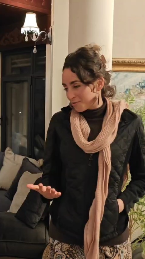 An Akiva participant speaking during an evening gathering