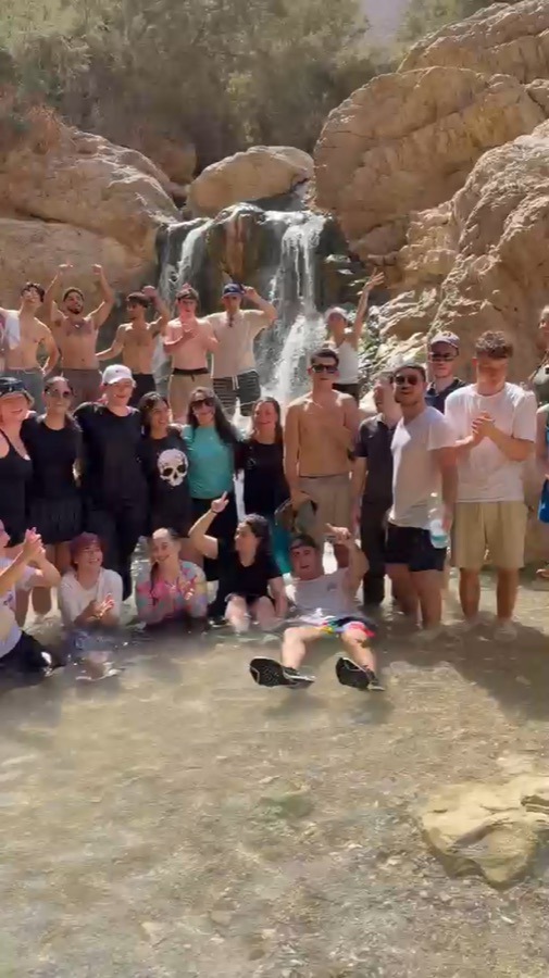 Akiva participants enjoying a waterfall together